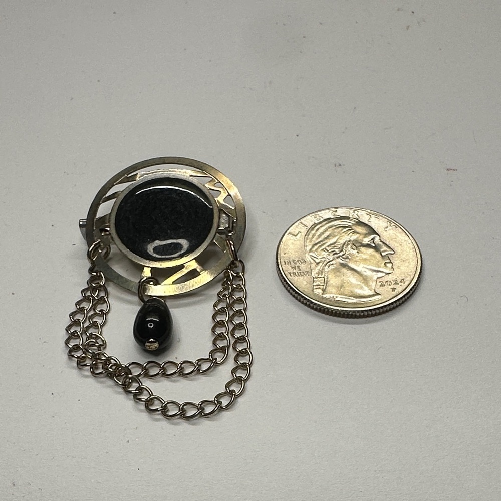 Silver and Black Brooch with Chain Detail